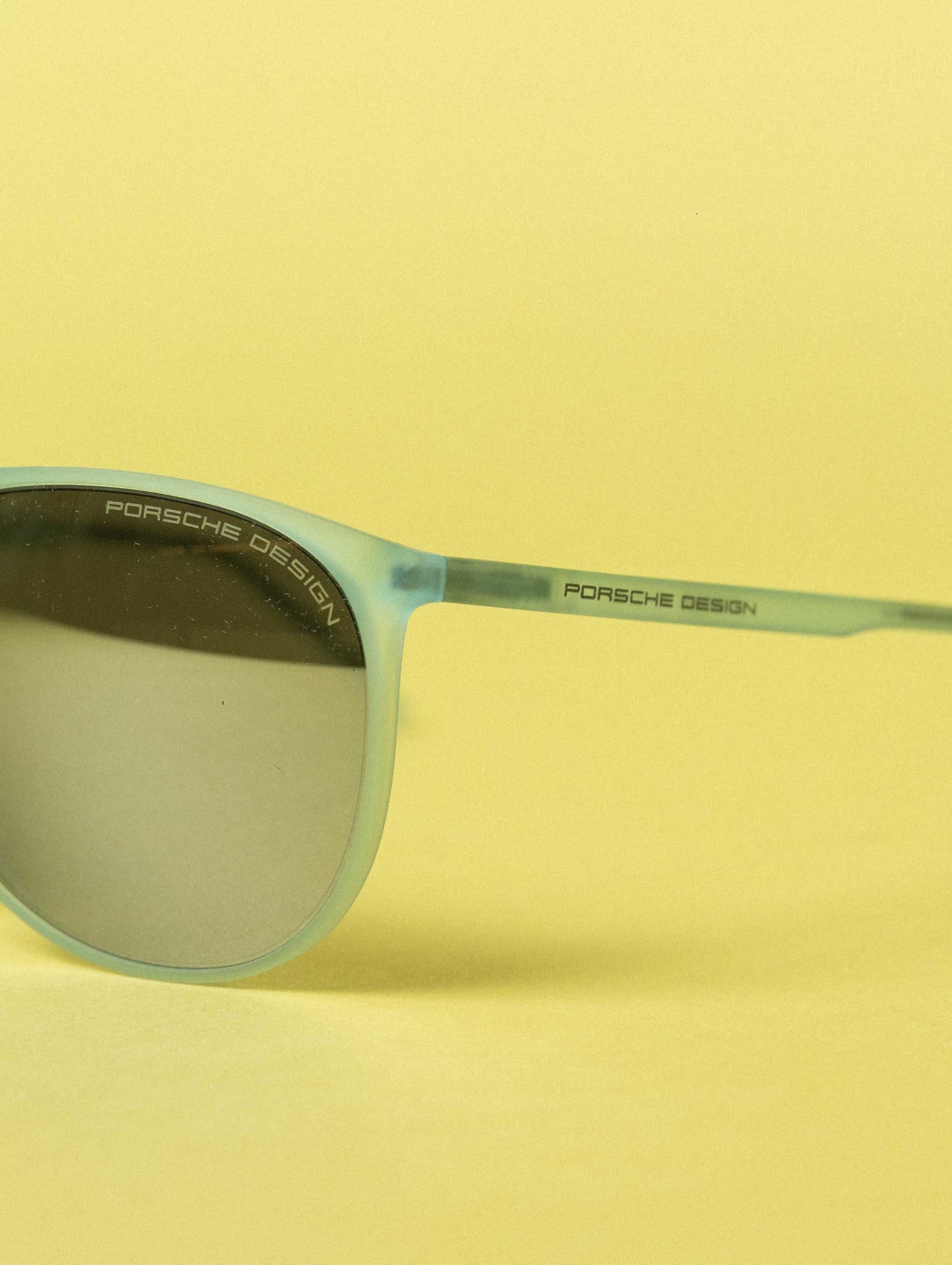 PORSCHE DESIGN Grey Oval Unisex Sunglasses - Transparent Blue