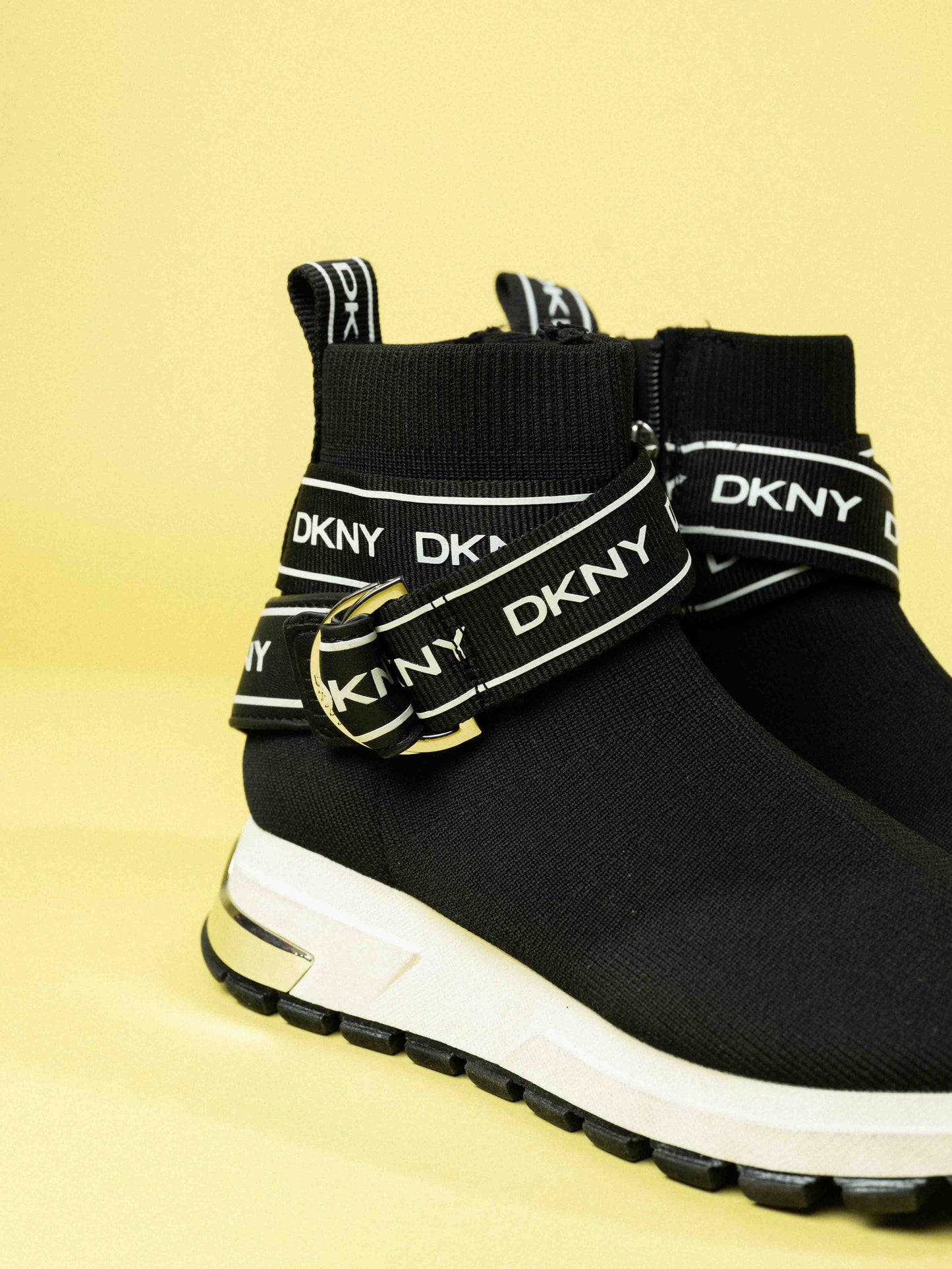 DKNY Women's High Top Slip-On Wedge Sneaker