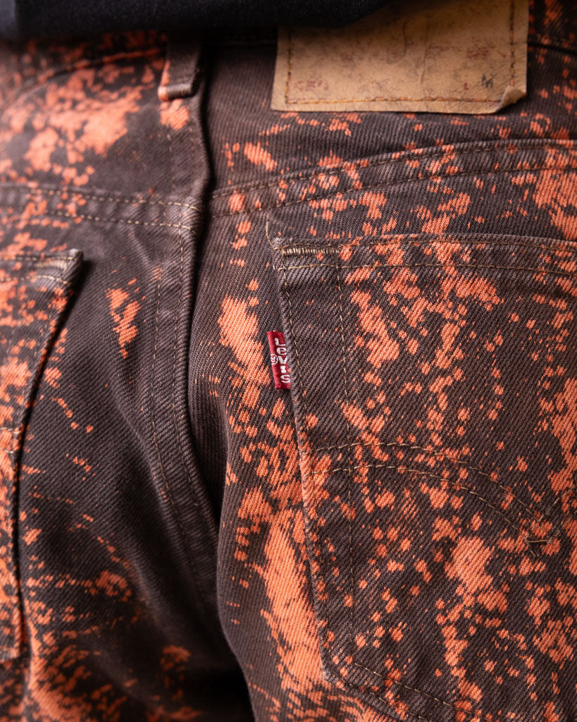 VINTAGE LEVIS BLACK/ RED BLEACHED OUT DENIM