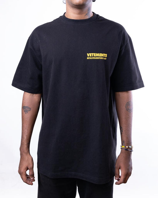 Vetements Logo-Printed T-Shirt In Black Cotton