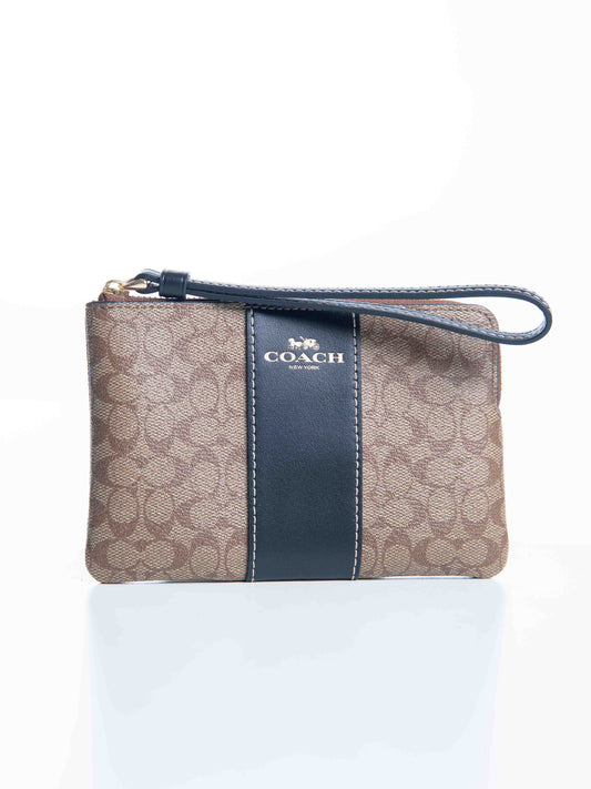 Coach Corner Zip Wristlet In Signature Canvas