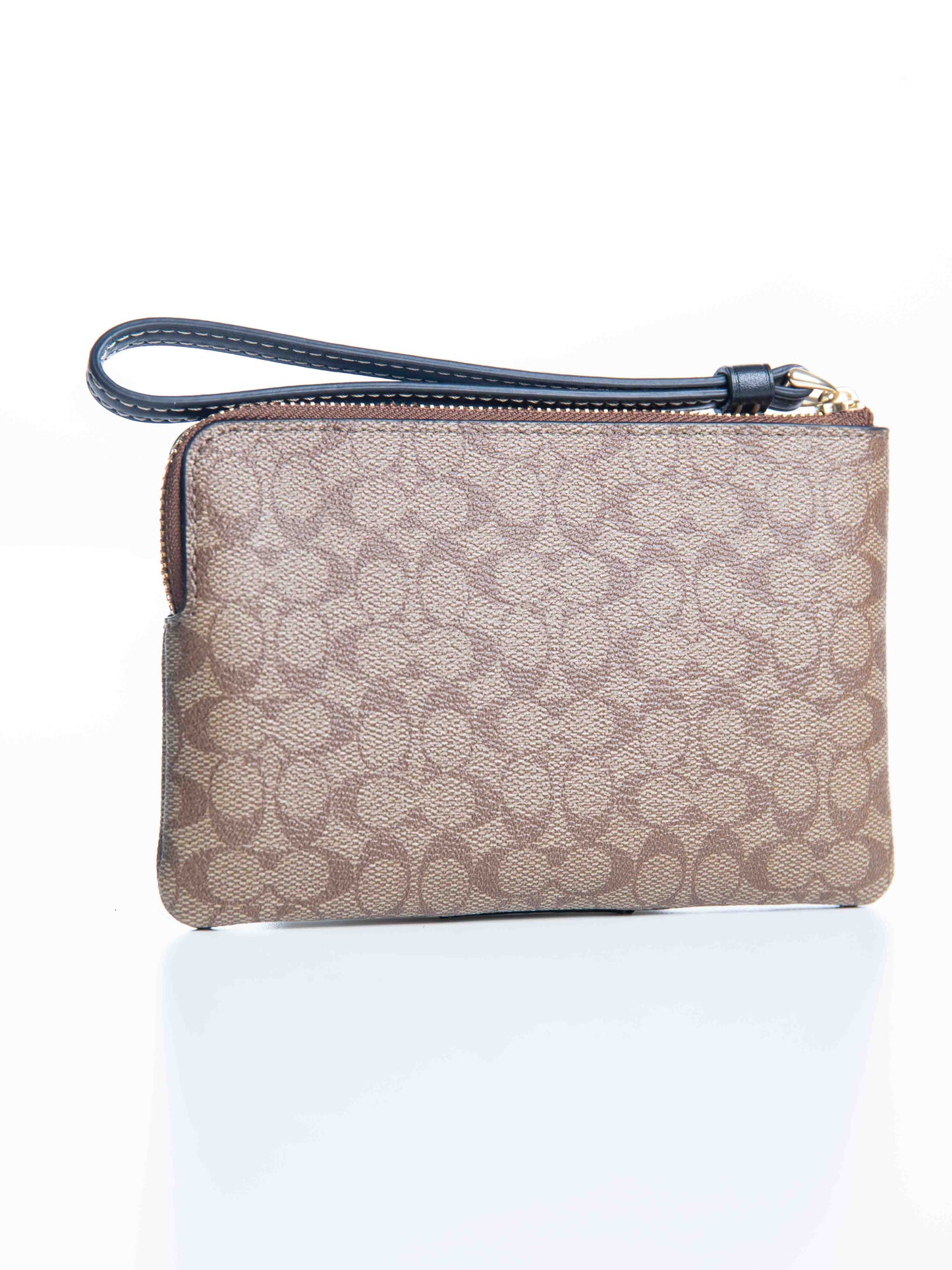 Coach Corner Zip Wristlet In Signature Canvas