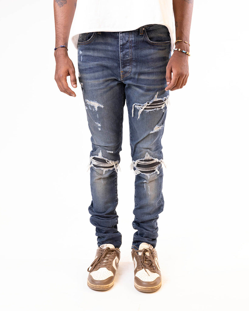 AMIRI MX1 SKINNY-FIT PANELLED DISTRESSED JEANS