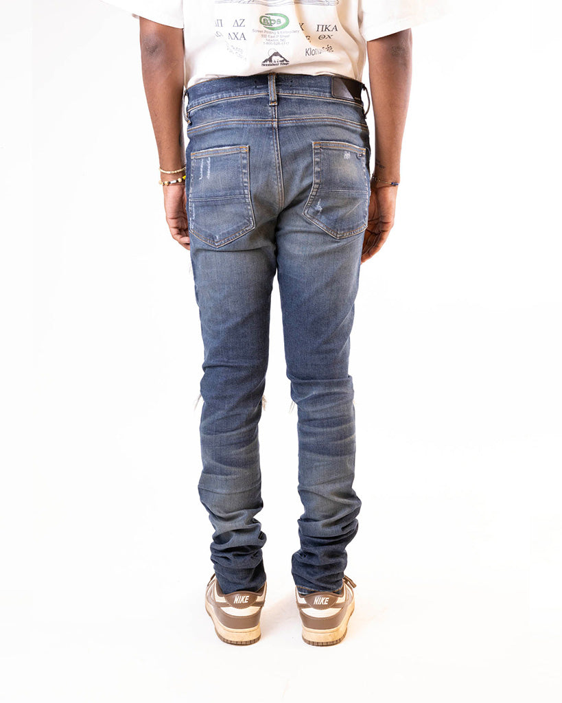 AMIRI MX1 SKINNY-FIT PANELLED DISTRESSED JEANS