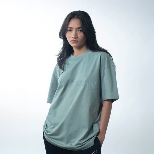 FEAR OF GOD ESSENTIALS SS TEE SYCAMORE